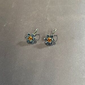 Sabika flower shaped lever back earrings.